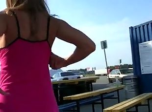 Young girl shows Tits and pussy on the street